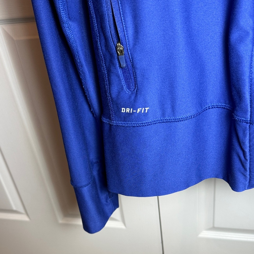 Nike Dri-Fit women’s Royal Blue Performance Jacket full zip up. - Picture 3 of 6
